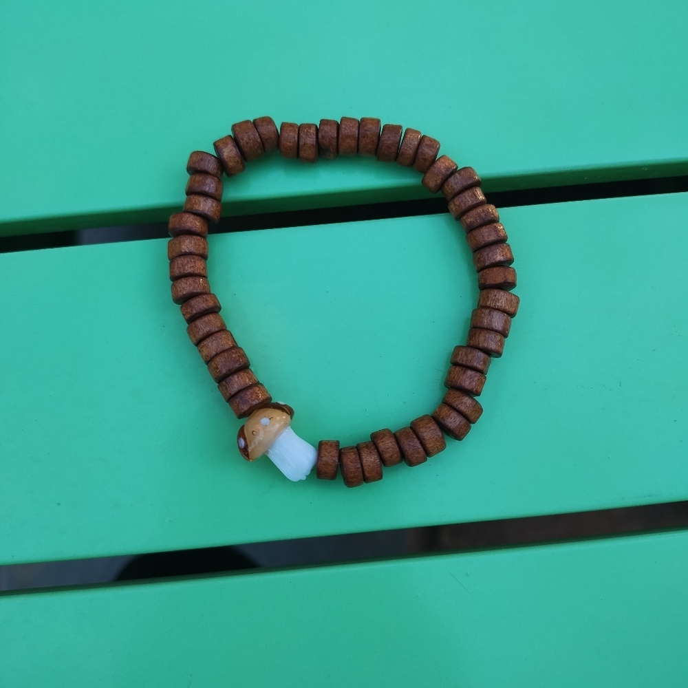 Hand beaded wooden and glass mushroom stretch bracelet